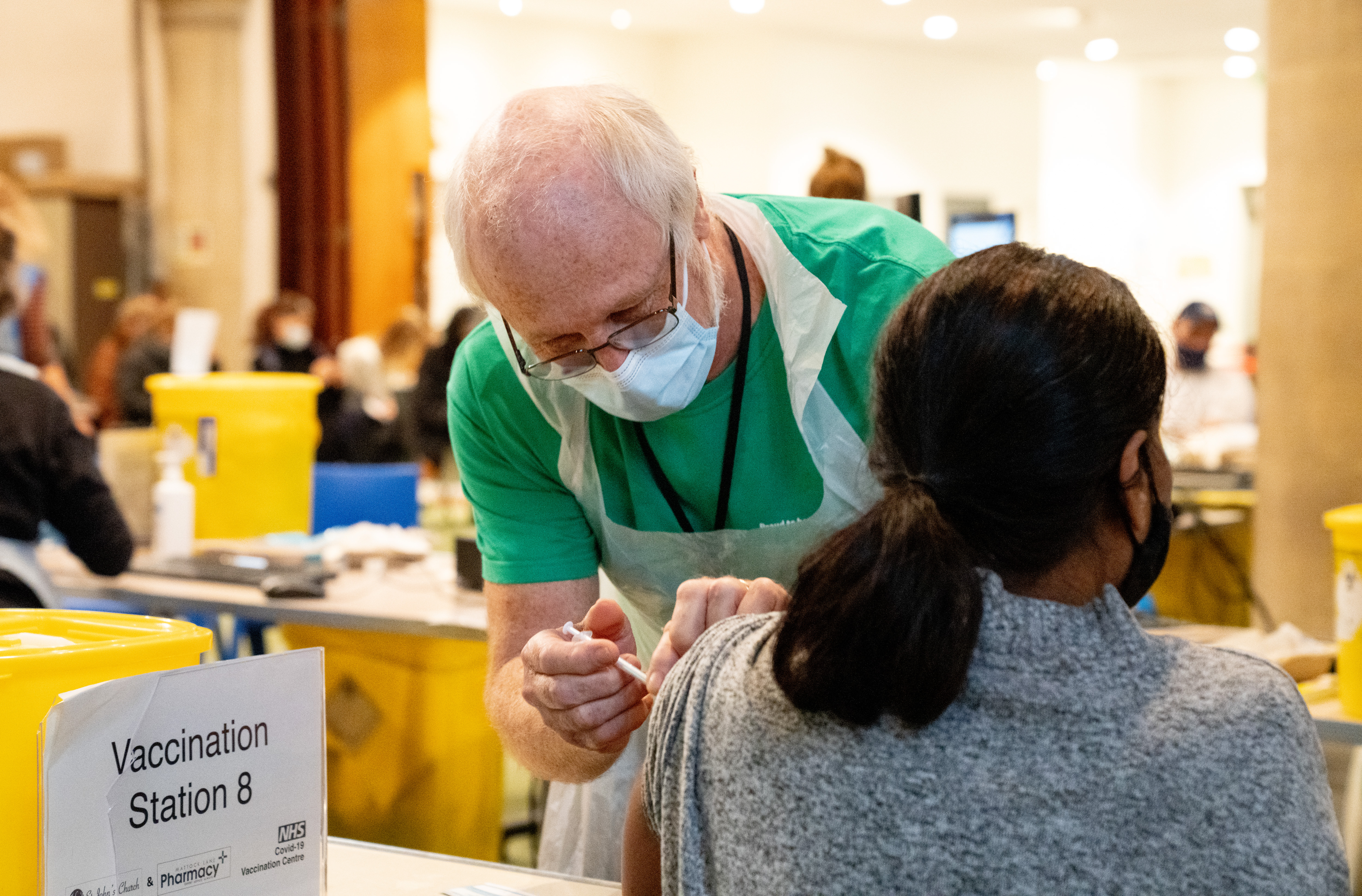 St John volunteer vaccinating.jpg