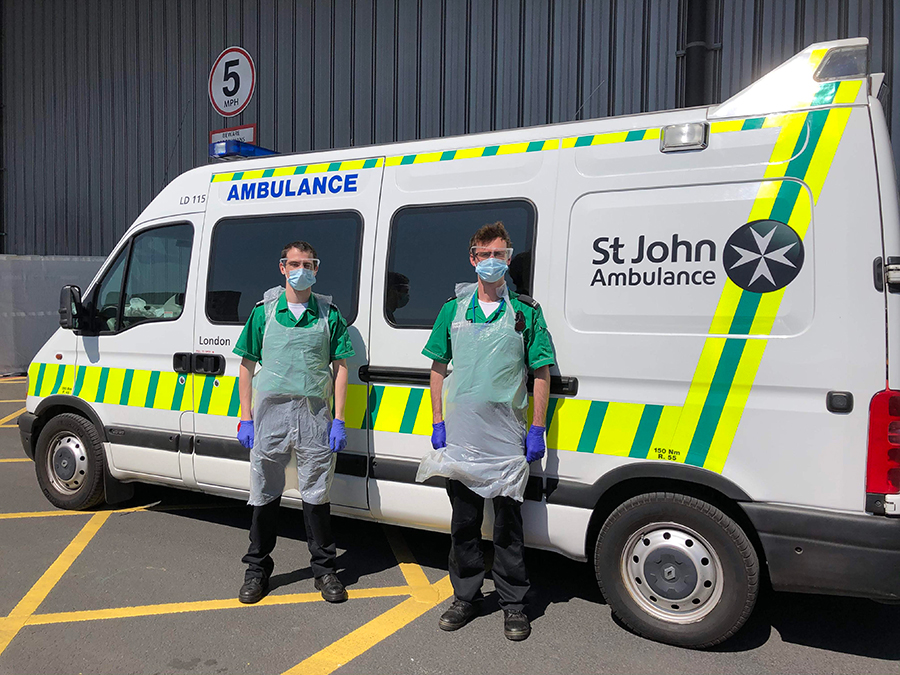 St John Ambulance team transferring patients