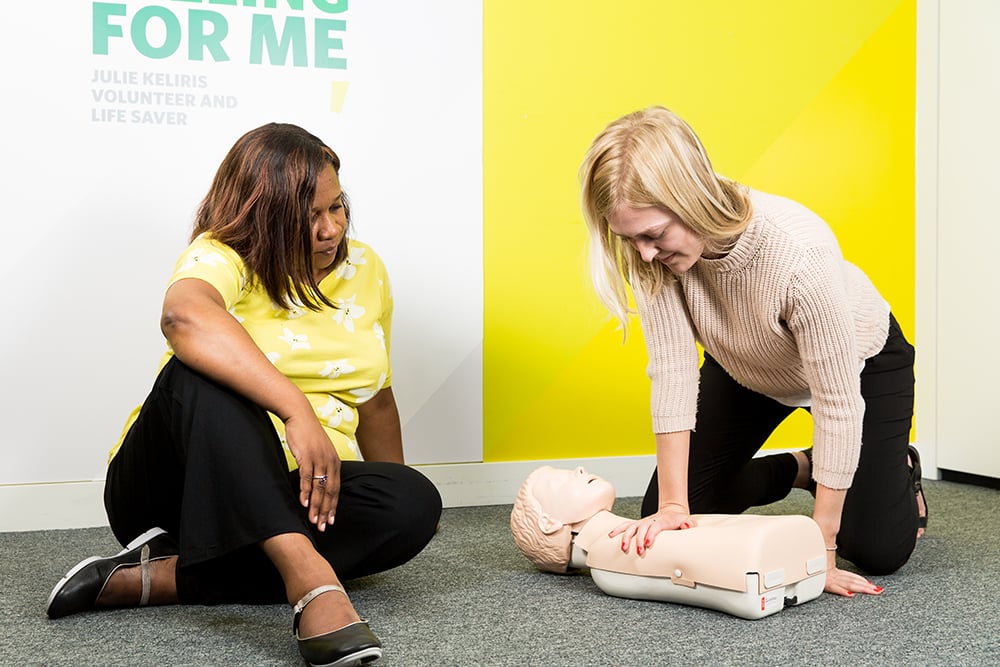 Delegates learning paediatric CPR