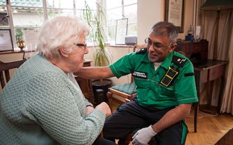 Community First Responder with patient in their home.