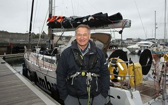 Sir David Hempleman Adams with his yacht
